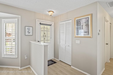 Step into this bright and inviting home featuring a formal on Timber Pines Golf Course in Florida - for sale on GolfHomes.com, golf home, golf lot