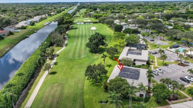 Welcome to your charming first-floor corner unit with beautiful on Hunters Run Golf and Country Club in Florida - for sale on GolfHomes.com, golf home, golf lot