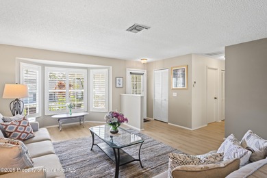 Step into this bright and inviting home featuring a formal on Timber Pines Golf Course in Florida - for sale on GolfHomes.com, golf home, golf lot