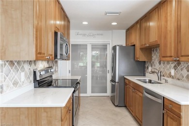 If you've been waiting for a main floor condo with a two-car on  in Florida - for sale on GolfHomes.com, golf home, golf lot