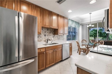 If you've been waiting for a main floor condo with a two-car on  in Florida - for sale on GolfHomes.com, golf home, golf lot