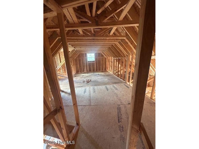 A gorgeous new home on the fairways of the prestigious Tiger's on Ocean Ridge Plantation in North Carolina - for sale on GolfHomes.com, golf home, golf lot