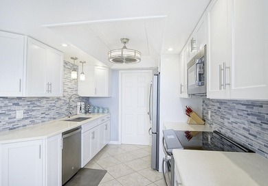 10th floor condo with absolutely stunning beachfront ocean and on Ocean Village Golf Course in Florida - for sale on GolfHomes.com, golf home, golf lot