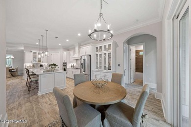 A gorgeous new home on the fairways of the prestigious Tiger's on Ocean Ridge Plantation in North Carolina - for sale on GolfHomes.com, golf home, golf lot