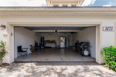 If you've been waiting for a main floor condo with a two-car on  in Florida - for sale on GolfHomes.com, golf home, golf lot