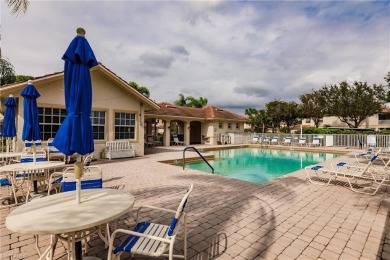 If you've been waiting for a main floor condo with a two-car on  in Florida - for sale on GolfHomes.com, golf home, golf lot