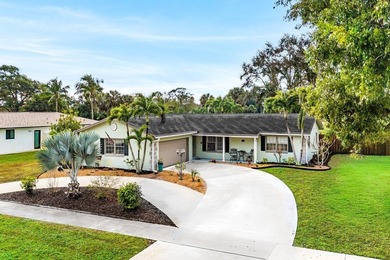 Enjoy easy Florida living in this well-cared-for 3-bedroom on Palm Beach National Golf and Country Club in Florida - for sale on GolfHomes.com, golf home, golf lot