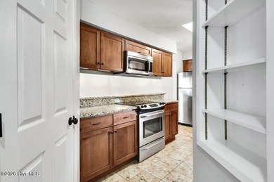 Nicely appointed Plantation Point upper unit condo. Plenty of on Belvedere Country Club in North Carolina - for sale on GolfHomes.com, golf home, golf lot