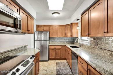 Nicely appointed Plantation Point upper unit condo. Plenty of on Belvedere Country Club in North Carolina - for sale on GolfHomes.com, golf home, golf lot