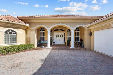 Experience luxury and privacy in this stunning home set on .67 on The Cape Club of Palm City in Florida - for sale on GolfHomes.com, golf home, golf lot