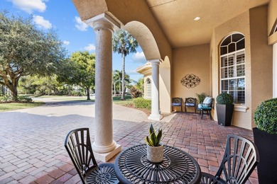 Experience luxury and privacy in this stunning home set on .67 on The Cape Club of Palm City in Florida - for sale on GolfHomes.com, golf home, golf lot