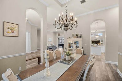 Experience luxury and privacy in this stunning home set on .67 on The Cape Club of Palm City in Florida - for sale on GolfHomes.com, golf home, golf lot