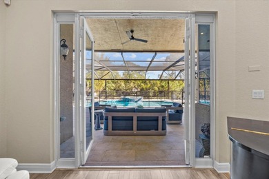 Experience luxury and privacy in this stunning home set on .67 on The Cape Club of Palm City in Florida - for sale on GolfHomes.com, golf home, golf lot