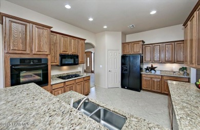 Welcome to your dream home nestled in the prestigious StoneRidge on StoneRidge Golf Course in Arizona - for sale on GolfHomes.com, golf home, golf lot
