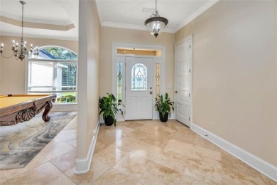 Absolutely Stunning! From the moment you walk in the travertine on Oak Grove Island Golf and Country Club in Georgia - for sale on GolfHomes.com, golf home, golf lot