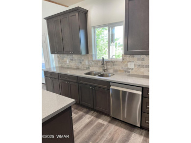 Beautiful new build overlooking the golf course, featuring on Snowflake Municipal Golf Course in Arizona - for sale on GolfHomes.com, golf home, golf lot