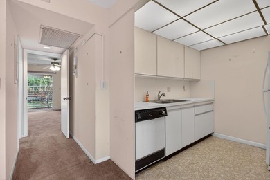 TLC-SALE OF THE CENTURY-POOL IN FRONT OF YOUR BLDG. 1 on Wynmoor Golf Course in Florida - for sale on GolfHomes.com, golf home, golf lot