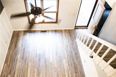 Enjoy relaxed lake living in this beautifully updated tri-level on Holiday Island Executive Golf Course in Arkansas - for sale on GolfHomes.com, golf home, golf lot