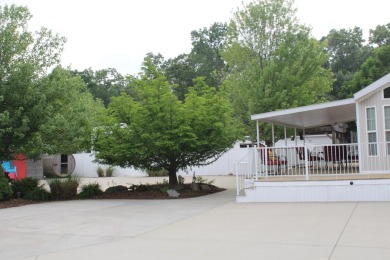 Relax & enjoy yourself. This charming 2004 cottage comes with on Marquette Trails Country Club in Michigan - for sale on GolfHomes.com, golf home, golf lot