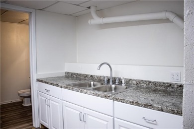 Enjoy relaxed lake living in this beautifully updated tri-level on Holiday Island Executive Golf Course in Arkansas - for sale on GolfHomes.com, golf home, golf lot