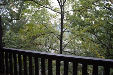 Enjoy relaxed lake living in this beautifully updated tri-level on Holiday Island Executive Golf Course in Arkansas - for sale on GolfHomes.com, golf home, golf lot