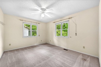 Discover a blend of nature and comfort in this 2 level home on Bella Vista Country Club - Berksdale in Arkansas - for sale on GolfHomes.com, golf home, golf lot