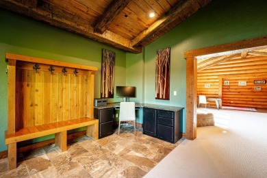 Welcome to 6 Donegal Drive -- a stunning custom log home tucked on The Powder Horn Golf Club - Mountain in Wyoming - for sale on GolfHomes.com, golf home, golf lot