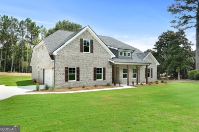 All Brick 5-BEDROOM home 3,213 sq. ft.  in prestigious Lake Dow on Canongate At Georgia National Golf Club in Georgia - for sale on GolfHomes.com, golf home, golf lot