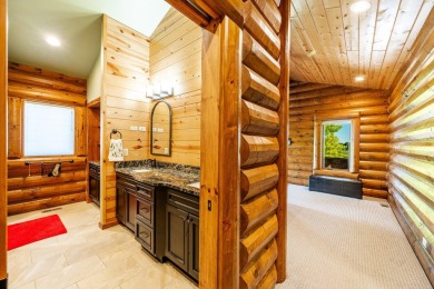 Welcome to 6 Donegal Drive -- a stunning custom log home tucked on The Powder Horn Golf Club - Mountain in Wyoming - for sale on GolfHomes.com, golf home, golf lot