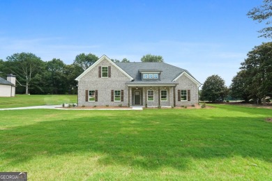 All Brick 5-BEDROOM home 3,213 sq. ft.  in prestigious Lake Dow on Canongate At Georgia National Golf Club in Georgia - for sale on GolfHomes.com, golf home, golf lot