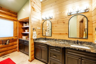 Welcome to 6 Donegal Drive -- a stunning custom log home tucked on The Powder Horn Golf Club - Mountain in Wyoming - for sale on GolfHomes.com, golf home, golf lot
