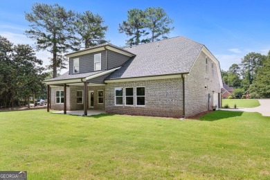 All Brick 5-BEDROOM home 3,213 sq. ft.  in prestigious Lake Dow on Canongate At Georgia National Golf Club in Georgia - for sale on GolfHomes.com, golf home, golf lot