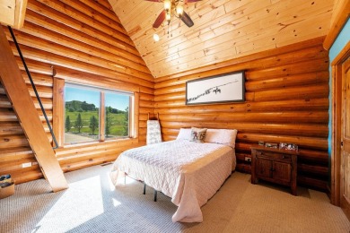 Welcome to 6 Donegal Drive -- a stunning custom log home tucked on The Powder Horn Golf Club - Mountain in Wyoming - for sale on GolfHomes.com, golf home, golf lot