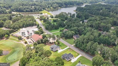 All Brick 5-BEDROOM home 3,213 sq. ft.  in prestigious Lake Dow on Canongate At Georgia National Golf Club in Georgia - for sale on GolfHomes.com, golf home, golf lot