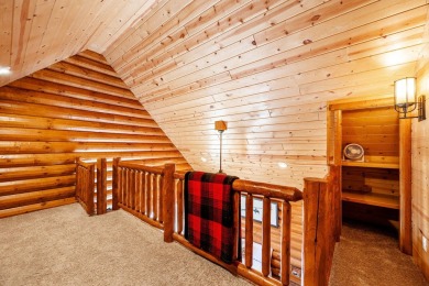 Welcome to 6 Donegal Drive -- a stunning custom log home tucked on The Powder Horn Golf Club - Mountain in Wyoming - for sale on GolfHomes.com, golf home, golf lot