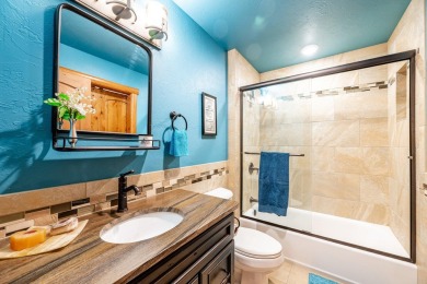Welcome to 6 Donegal Drive -- a stunning custom log home tucked on The Powder Horn Golf Club - Mountain in Wyoming - for sale on GolfHomes.com, golf home, golf lot