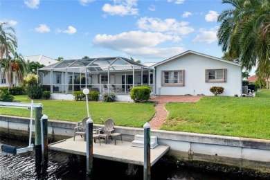 PRIME WATERFRONT LOCATION IN PUNTA GORDA ISLES! ATTRACTIVE 2 on Saint Andrews South Golf Club in Florida - for sale on GolfHomes.com, golf home, golf lot