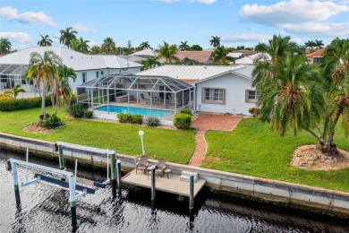 PRIME WATERFRONT LOCATION IN PUNTA GORDA ISLES! ATTRACTIVE 2 on Saint Andrews South Golf Club in Florida - for sale on GolfHomes.com, golf home, golf lot