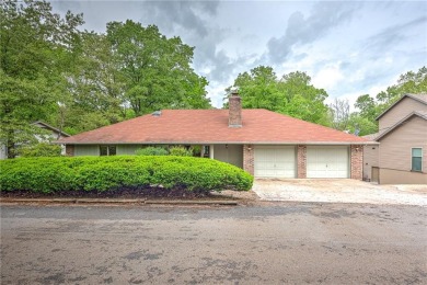 Discover a blend of nature and comfort in this 2 level home on Bella Vista Country Club - Berksdale in Arkansas - for sale on GolfHomes.com, golf home, golf lot