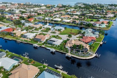 PRIME WATERFRONT LOCATION IN PUNTA GORDA ISLES! ATTRACTIVE 2 on Saint Andrews South Golf Club in Florida - for sale on GolfHomes.com, golf home, golf lot