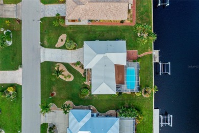 PRIME WATERFRONT LOCATION IN PUNTA GORDA ISLES! ATTRACTIVE 2 on Saint Andrews South Golf Club in Florida - for sale on GolfHomes.com, golf home, golf lot