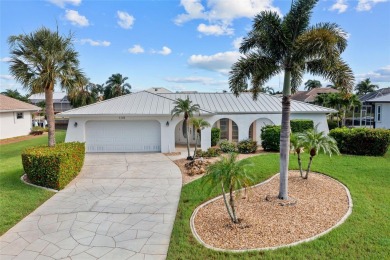 PRIME WATERFRONT LOCATION IN PUNTA GORDA ISLES! ATTRACTIVE 2 on Saint Andrews South Golf Club in Florida - for sale on GolfHomes.com, golf home, golf lot