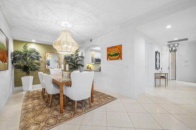 Updated first floor condo available in the desirable community on BallenIsles Golf and Country Club in Florida - for sale on GolfHomes.com, golf home, golf lot