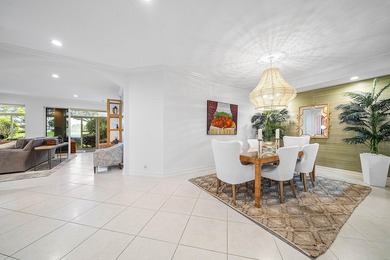 Updated first floor condo available in the desirable community on BallenIsles Golf and Country Club in Florida - for sale on GolfHomes.com, golf home, golf lot