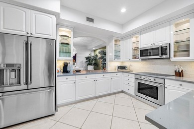 Updated first floor condo available in the desirable community on BallenIsles Golf and Country Club in Florida - for sale on GolfHomes.com, golf home, golf lot