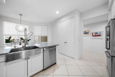 Updated first floor condo available in the desirable community on BallenIsles Golf and Country Club in Florida - for sale on GolfHomes.com, golf home, golf lot