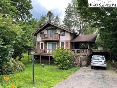 Located in the highly sought-after Linville Land Harbor, this on Land Harbor Golf Course in North Carolina - for sale on GolfHomes.com, golf home, golf lot