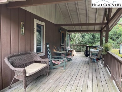 Located in the highly sought-after Linville Land Harbor, this on Land Harbor Golf Course in North Carolina - for sale on GolfHomes.com, golf home, golf lot
