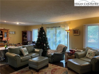 Located in the highly sought-after Linville Land Harbor, this on Land Harbor Golf Course in North Carolina - for sale on GolfHomes.com, golf home, golf lot