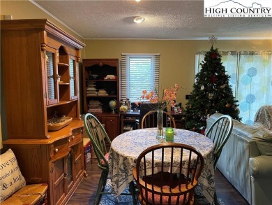 Located in the highly sought-after Linville Land Harbor, this on Land Harbor Golf Course in North Carolina - for sale on GolfHomes.com, golf home, golf lot